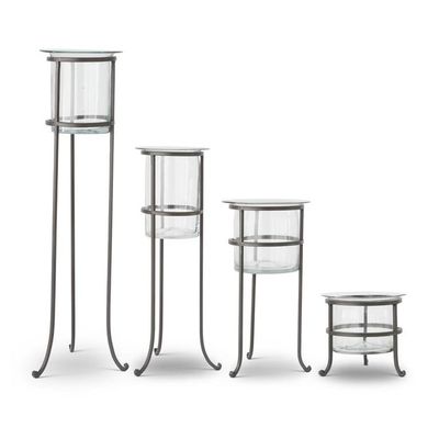 Clear Vase On Dark Metal Stand